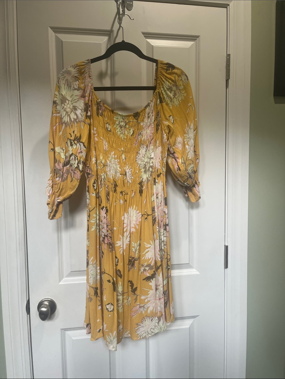 Mustard Floral Dress with 3/4 length sleeves.